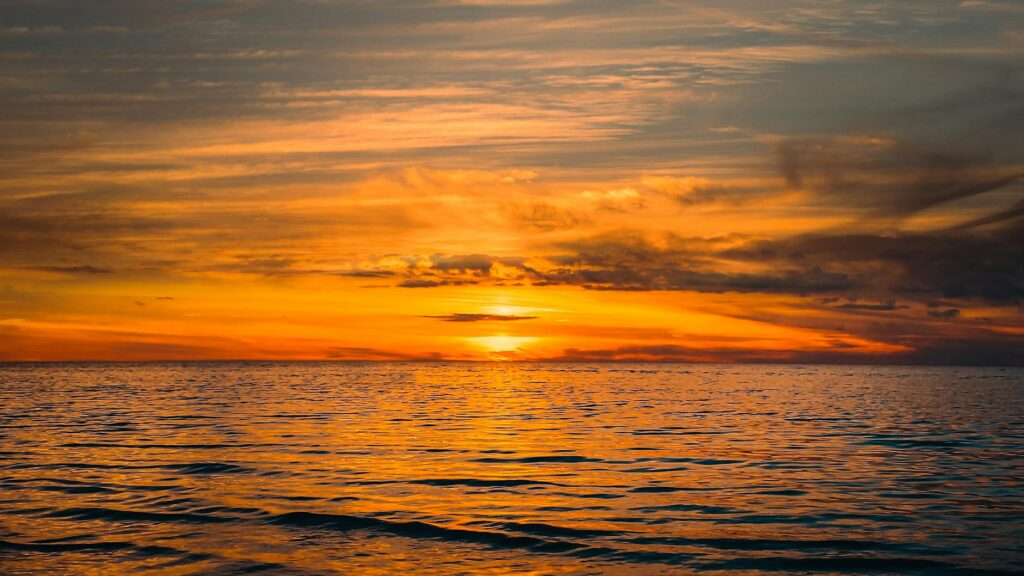 a sunset on the ocean