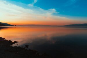scenic view of a lake during sunset